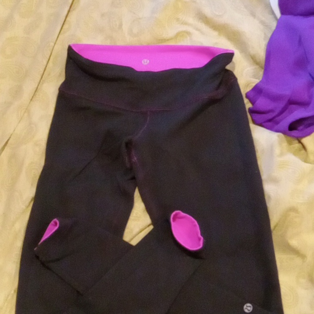 Size 6 Lululemon reversible yoga pants like new black and hot pink full length